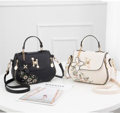 China 2022 Shoulder Cute Ladies Fashion Embroidery Portable Blue Floral Designs Leather Women's Handbags for sale