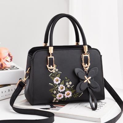 China Portable Wholesale Popular Ladies Shoulder Red Floral Embroidery Designs Handbag Leather Trim Women Tote Bags for sale