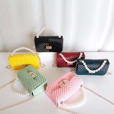 China Others cheap 2022 wholesale mini pearl handbags designer girls handbag children kids freeze pearl purses for sale