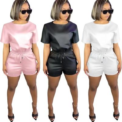 China QUICK DRY Summer sets for women clothing casual solid pu leather short sleeve t shirt two piece short set women for sale