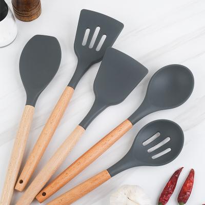 China Sustainable Kitchen Accessories Silicone Cooking Tool Kits With Wooden Handle 11pcs Kitchen Utensils Set for sale