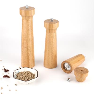 China Sustainable Acacia Wood Kitchen Grinder Cruet Salt Peppers Caster Tool Manual Coating Seasoning Pepper Grinder for sale