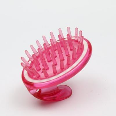 China Waterproof Plastic Hand Held Scalp Massager Comb For Scalp Treatment for sale