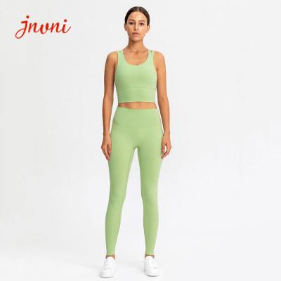 China 2pcs Suitwear Cross Strappy 210gsm Gym Wear Sets TUV Women'S Athletic Wear Sets for sale