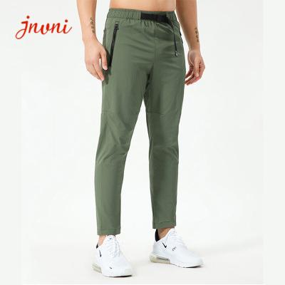 Chine L'Activewear des hommes 130gsm en soie de glace base le pantalon de séchage rapide augmentant plus des pantalons de taille à vendre