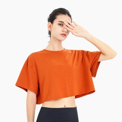 中国 女性の綿の通気性の緩く短い袖のActivewearのTシャツ 販売のため