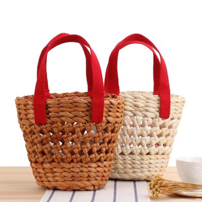 China 2021 Fashion nsa small summer hot sale brown straw beach bag with red handles for sale