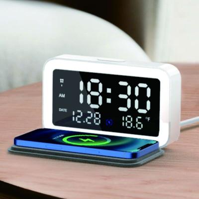 China Perpetual Calendar Alarm Clock New Product Wireless Charger Alarm Clock Nightstand Light Folding Portable Fast Charging Protection On Phone 15W Amazon Hot Sale for sale