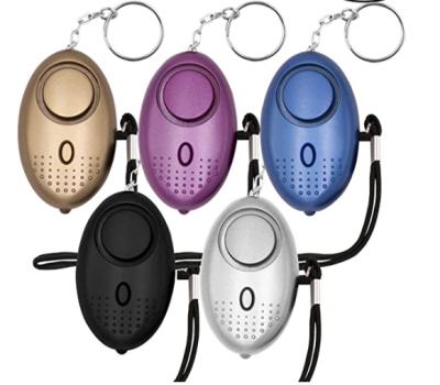 China 130dB Multi-Color Personal Alarm Tamper Alarm Safety Whistle Security Siren Key Chain Alarm Sound Alarm With Led Light for sale