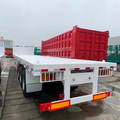 China Semi Trailer with Side Beam 16mm Channel Steel Used 12 Wheel Flatbed Trailer for sale