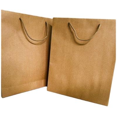 China Wholesale Custom Logo Printed Recyclable Kraft Paper Brown Shopping Bag Tote Bag With Handle for sale