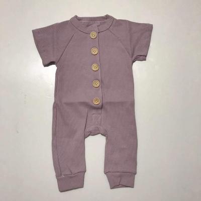 China Cute Ready To Ship Purple Organic Cotton Short Sleeve Clearance Pants Baby Button Rompers for sale