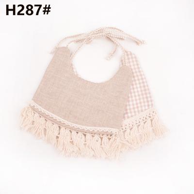 China Washable 100% Cotton Drool Bibs for Boys and Girls Soft Muslin Baby Bibs with Tassel for sale