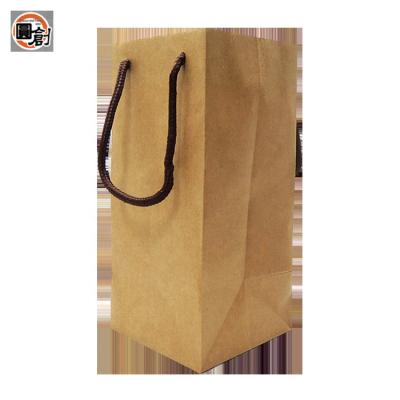 China Handmade Flexiloop 10.5*10.5*22.5cm Custom Made Handmade Handle Kraft Paper Bag for sale