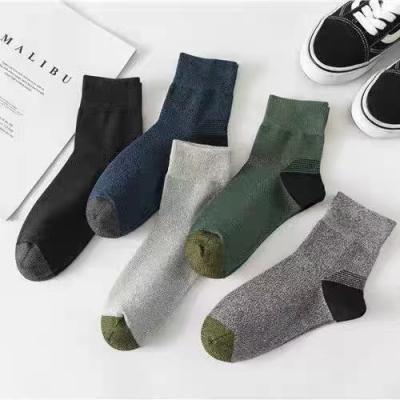 China Customized Antibacterial LOG Tube Cotton Medium Socks Sweat-absorbent and Breathable Business Men Socks for sale