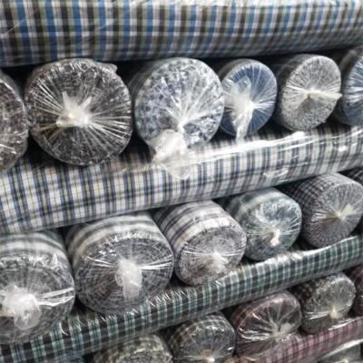 China Shrink-resistant fabric stocks 100% polyester fabric garment beach panty stocklot surplus fabric for sale