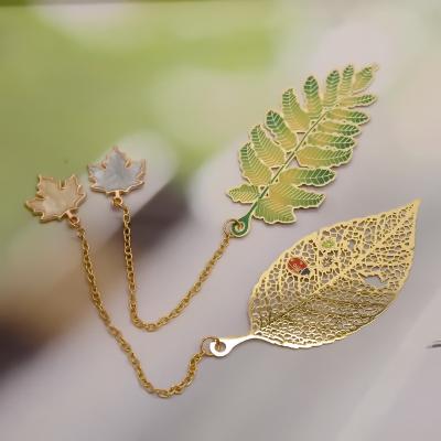 China Custom Made Australian Cute Leaf Tassel Metal Bookmark for sale