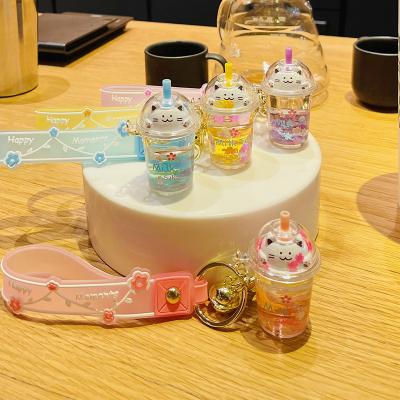 China Dickmon Logo Car Bag Plastic Pendant 3D Cartoon Cat Sakura Milk Tea Cup Keychain Acrylic Pendant Custom Oil Bottle Floating Key Chains for sale