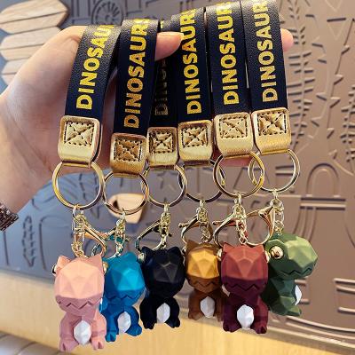 China Wholesale 3D Cartoon Animal Car Pendant Dickmon Couples Bag Doll Charm Animation Resin Cute Dinosaur Keychains for sale