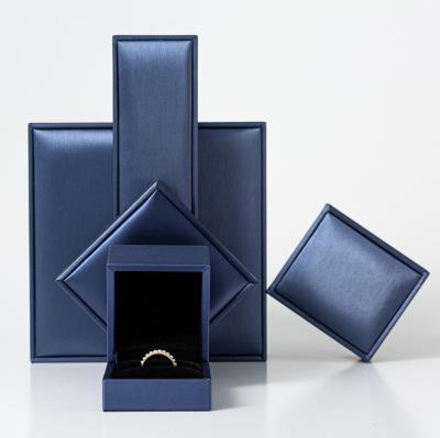 China 2020 Wholesale Luxury Exquisite Blue Color Eco-friendly Leatherette Ring Earring Ring Jewelry Box Leather Jewelry Box for sale