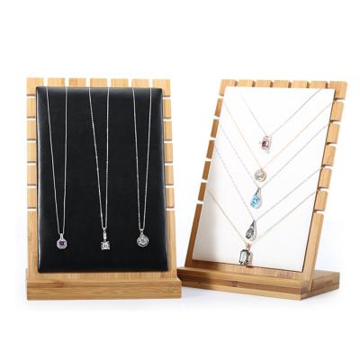 China 2020 Eco-Friendly Hot Selling Leather Black White Bamboo Necklace Jewelry Display Stand Necklace Holder Jewelry Display for sale