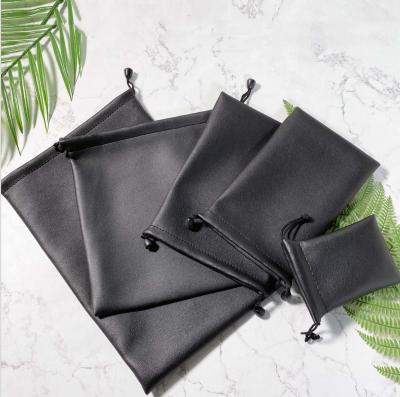 China 2022 eco-friendly logo jewelry bag 2022 luxury black leather pouch personalized leather jewelry ring earring pouch for sale