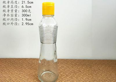 China 500ml Transparent Glass Bottle For Oil / Glass Vinegar Bottles With Spiral Lid for sale