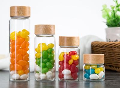 China 500ml Glass Storage Jars With Wood Lid / Transparent Glass Candy Jars In Bulk for sale