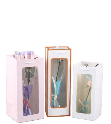 China New handmade transparent window packaging bag, flower packaging bag, bear gift bag for sale