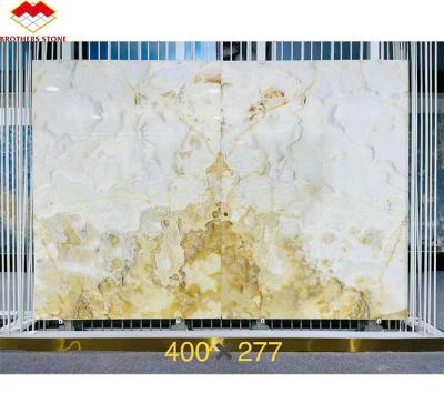 China Cut-To-Size Polished Luxury Translucent White Onyx Marble Slab for Villa Wall Art Panel for sale