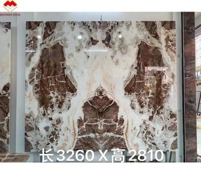 China Translucent Blood-Orange Red Onyx Stone with White Veins CNF Red Wood Veins Marble Wall Panel for sale