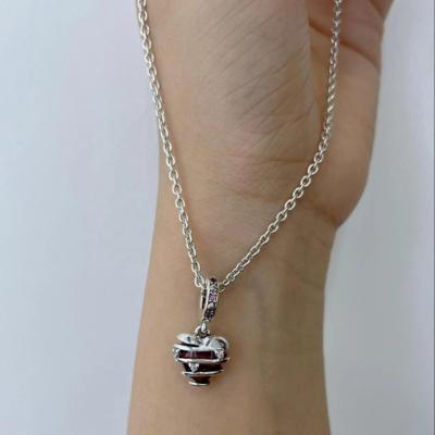 China TRENDY Silver Plated 40+5cm Extension Ruby Stone Diamond Hollow Out Heart Shape Pendant Necklace For Women Girls for sale