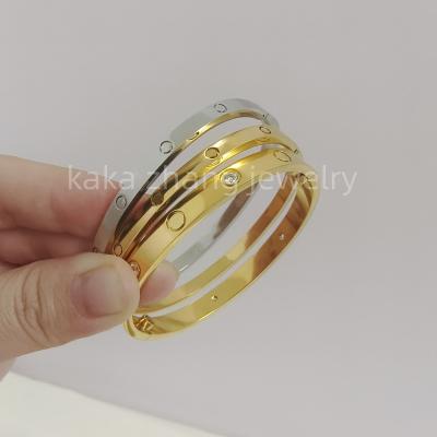 China 2023 High Quality Trendy Fashion Jewelry Rose Gold 18K Gold Rhodium Plated Stainless Steel 4MM Width No CZ Female Love Screw Bangle Bracelet for sale