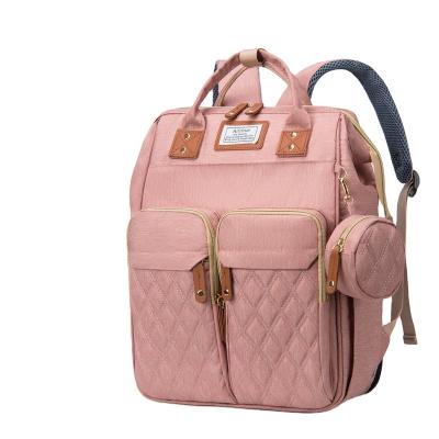 China With usb quality custom logo travel bull diaper bag foldable backpack with stroller straps baby for women with bed and usb for sale