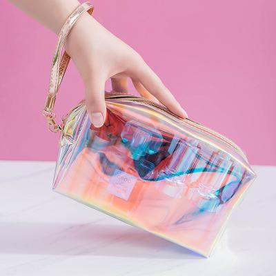 China Custom Printed Waterproof Ladies Waterproof Travel Storage Zippered Frame Cosmetic Bag PVC Transparent Clear Makeup Filter for sale