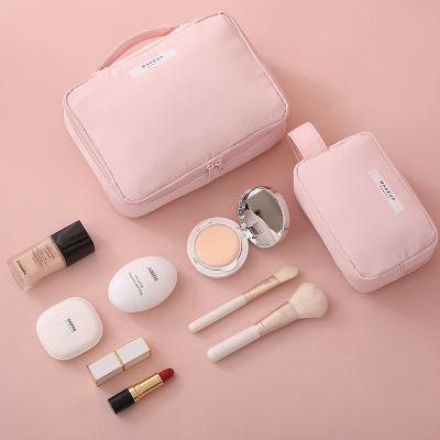 China Low Moq Travel Convenience Wholesale Logo Pink Travel Makeup Cosmetic Case Bag Insist Travel Waterproof Custom Cute Pink Storage for sale