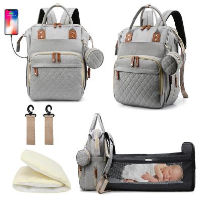 China With multi-functional custom waterproof mummy babi baby diaper bag usb diaper bag with cradle for sale