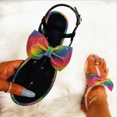 China Ladies Waterproof Jelly Shoes Glitter Rhinestone Bow Slides Flat Sandals For Women for sale