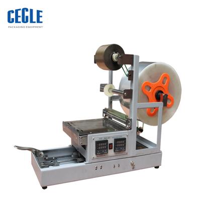 China Commodity Stretching Wrapping Machine Manual Candy Wrapping Machine for sale