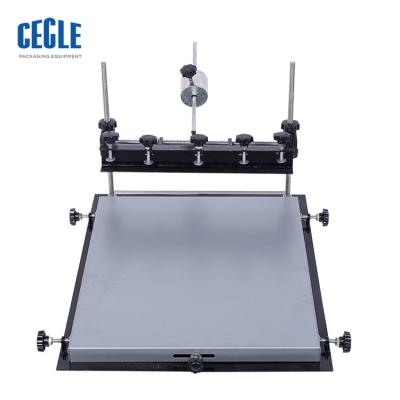 China Mini Simple Portable Cheap Manual T-shirt Screen Printing Machine for sale