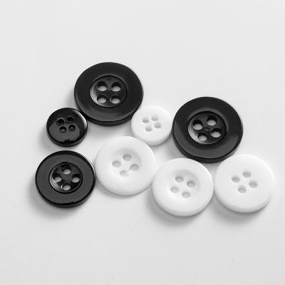 China Dry Cleaning Resin Button For Shirt 2 Holes Round Sew Roll To Form Transparent Resin Button for sale