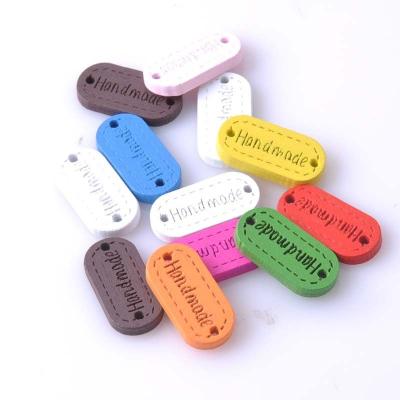 China Sustainable Wooden Tag Colored Rectangle Two Holes Wooden Tag Design Wooden Tag Button For DIY Wood Tag for sale