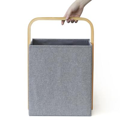 China 600D Handle Portable Dirty Cation Bamboo Folding Laundry Hamper European Naham Dirty Narrow Basket for sale