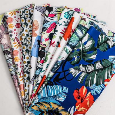 China Factory Hot Selling Custom QUICK DRY Spot Polyester Digital Printed Stretch Twill Peach Skin Fabric For Mens Beach Pants for sale