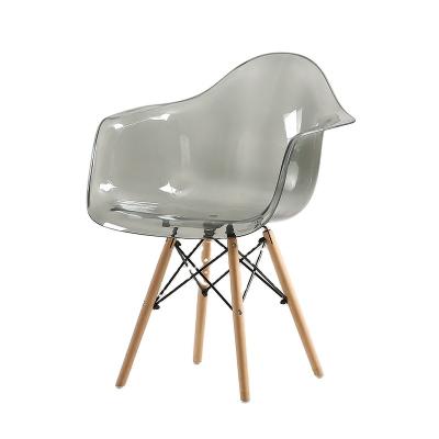 China Wholesale Antirust Plastic Transparent Armchair Wooden Legs Dining Chair for sale