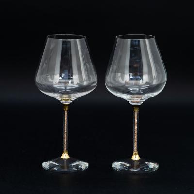 China Luxury Product 530ml Christmas Blown Design Crystal Gold Stem Wine Glass for sale