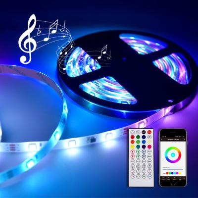 China Residential Smart Sync LED Music Light Multicolor Strip, 3M Tape Dreamcolor 24V LED RGB 5050 SMD Remote Control Strip Light for sale