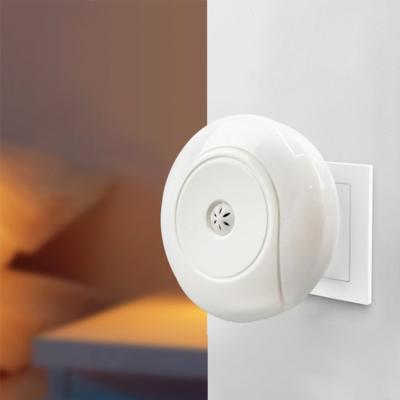 China Modern CE RoHS Round Shape 1W Wall Socket Lamp Sensor Night Light For Kids for sale