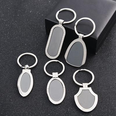 China Advertising/Promotional Gifts/Reading Key Ring Business Gift Handmade Engraved Logo Blank Zinc Alloy Keychain Custom Made for sale