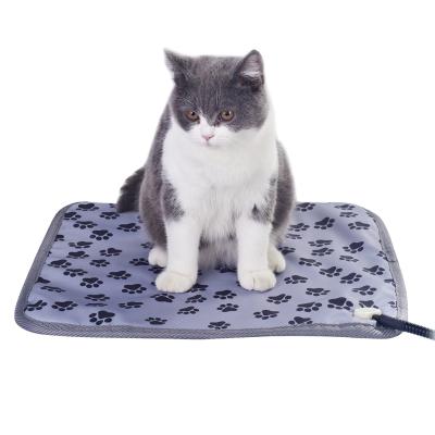 China Sustainable Waterproof Electric Pet Warm Bed For Dogs And Cats Winter Heating Pet Mat for sale